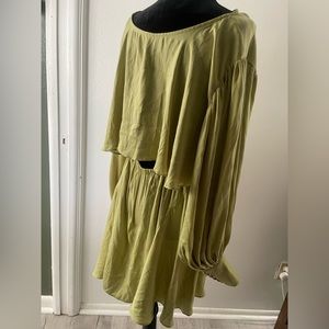Unique silky dress from Free People. Rare Find in perfect condition